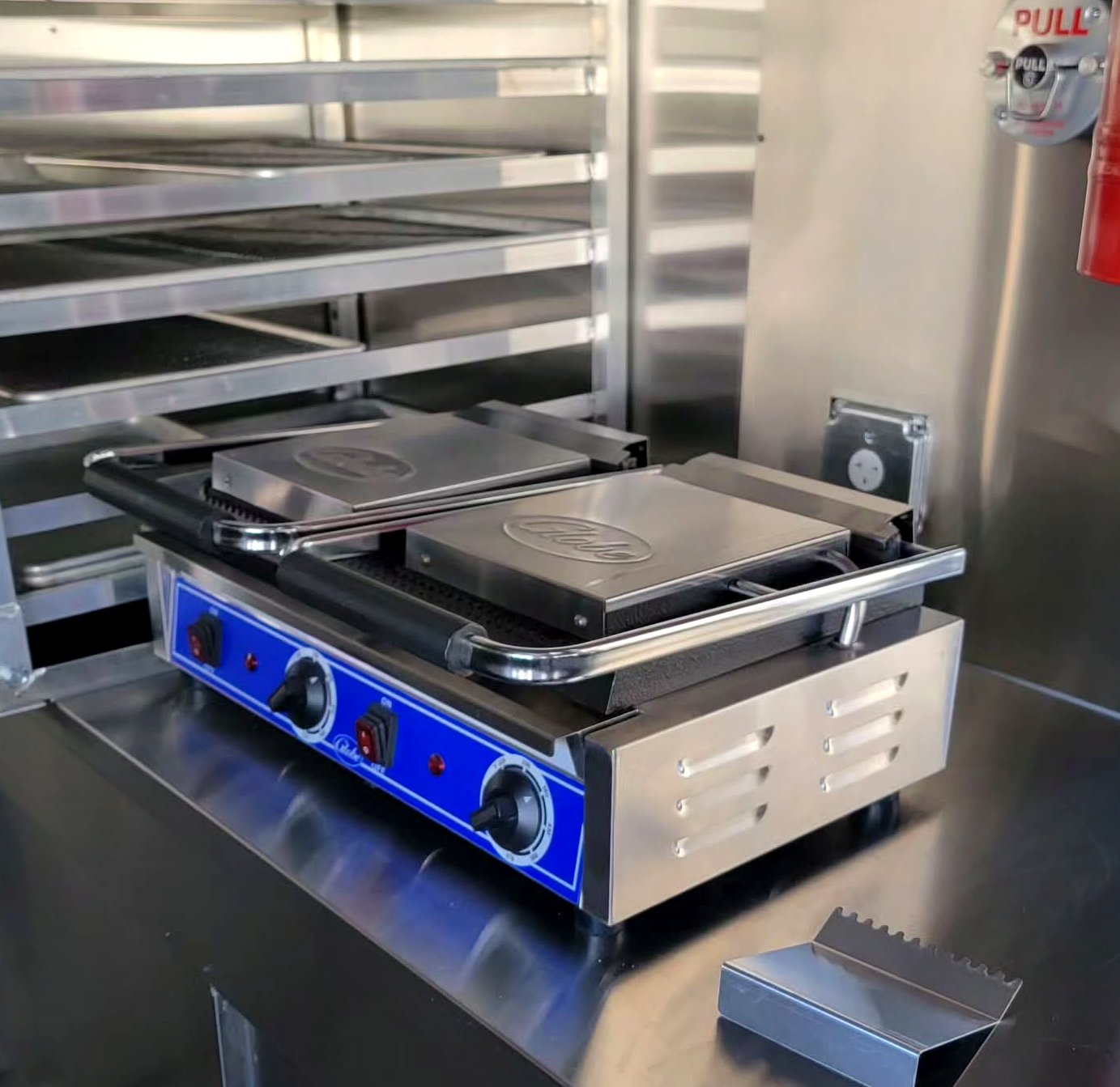 Double Globe panini press installed in stainless interior
